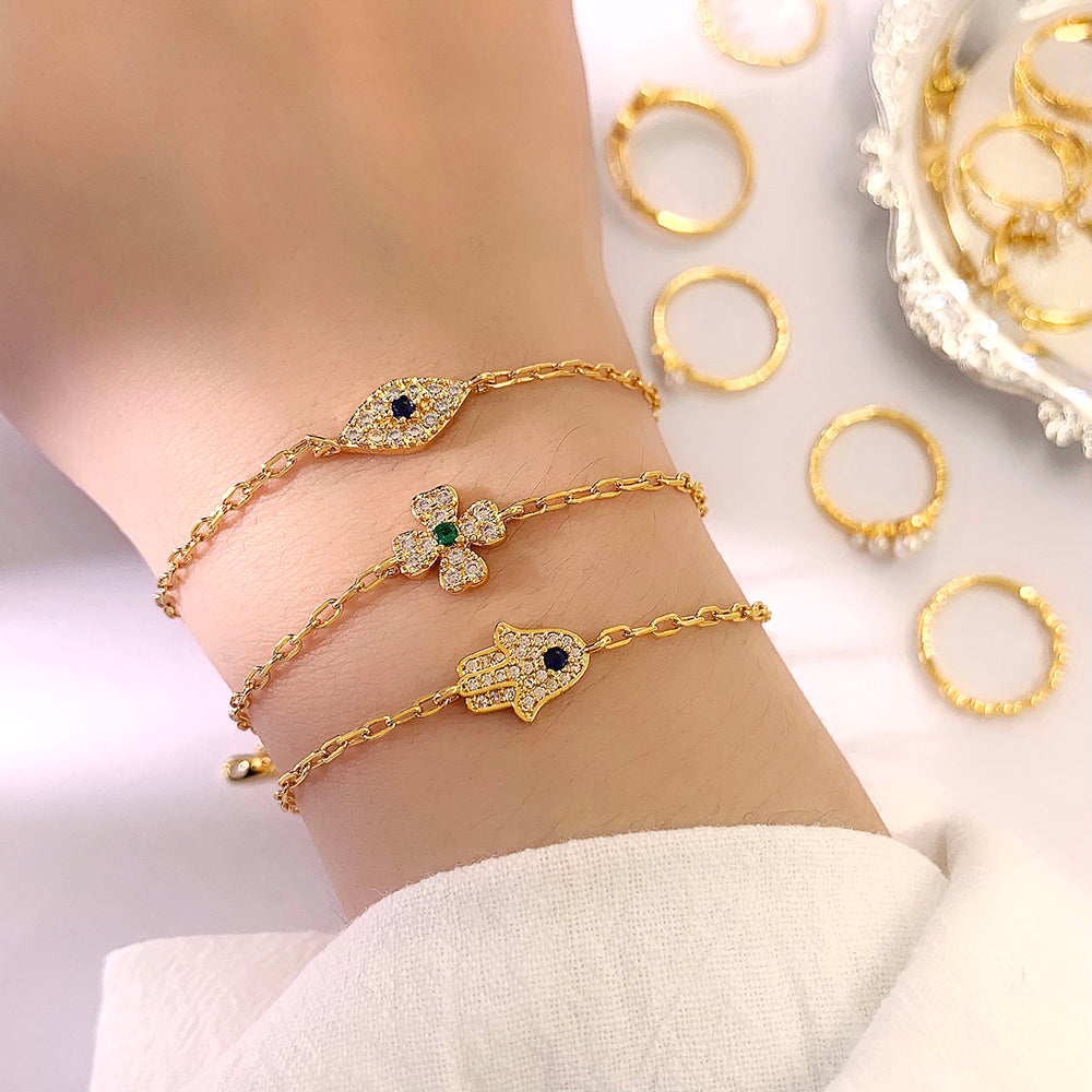 Wholesale Jewelry Gold Plated Eye Flower Hamsa Hand Cz Link Chain Bracelet price of 12 pieces